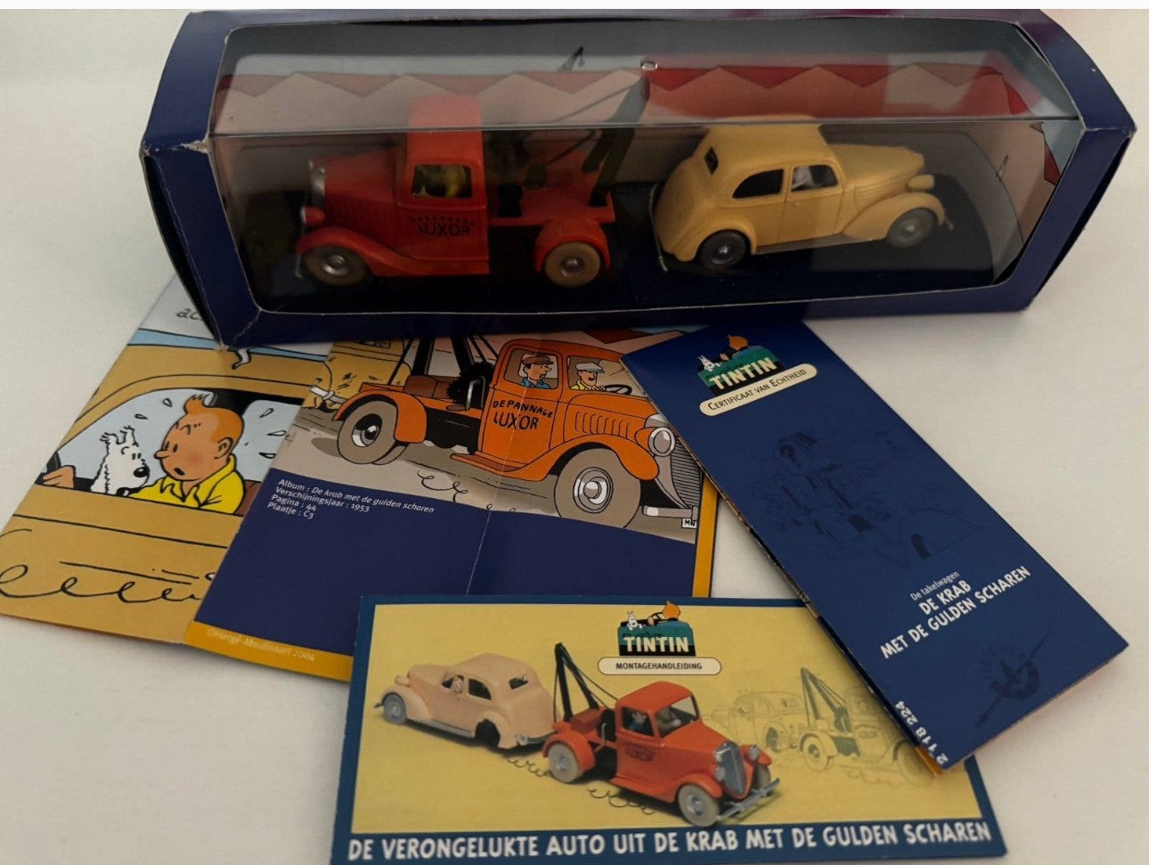 Kuifje auto 1:43  de takelwagen + schade auto  crab gulden s, Enlèvement ou Envoi, Tintin, Comme neuf
