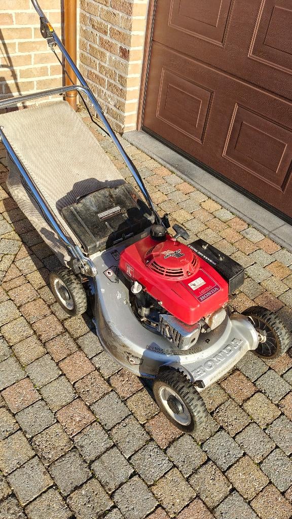 Benzine grasmaaier Honda hr194, Tuin en Terras, Grasmaaiers, Gebruikt, Benzine-grasmaaier, 50 cm of meer, Cirkelmaaier, Opvangzak