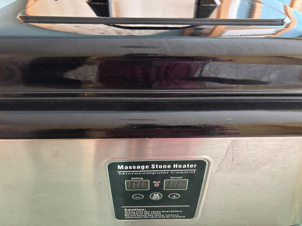 Hot stone heater, Ophalen, Zo goed als nieuw