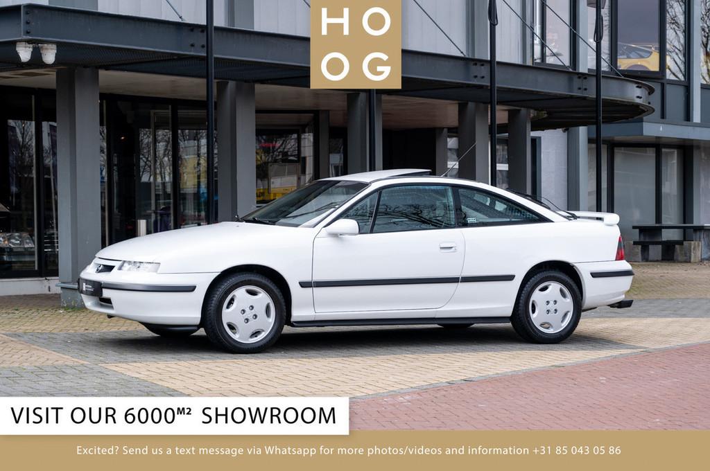 Opel Calibra 2.0i 16V (bj 1996), Auto's, Oldtimers, 100 kW, Zwart, 136 pk, Wit