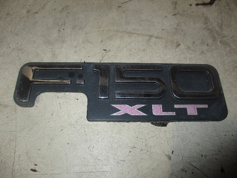 LOGO / EMBLEME F-150 Standard Cab (f65b-16b114-caw), Pièces américaines, Henry-Ford-Straße  1
50735  Köln, DE, Ford-Werke GmbH