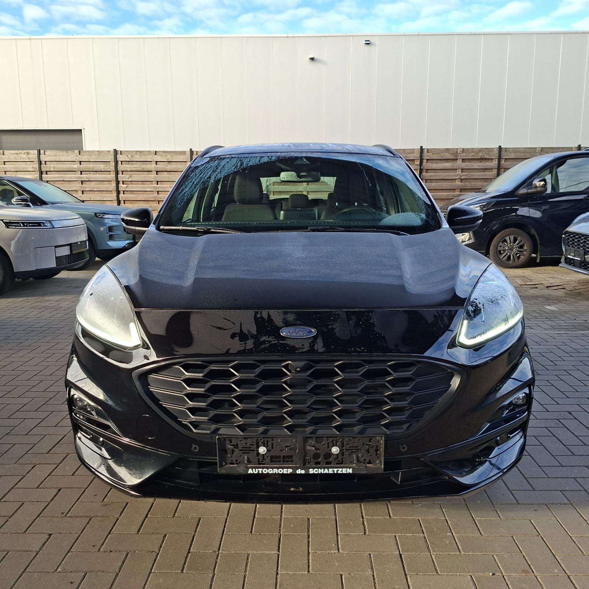 Ford Kuga St - Line PHEV / Winterpack / Head up Display, Auto's, Automaat, Stof, Gebruikt, Zwart