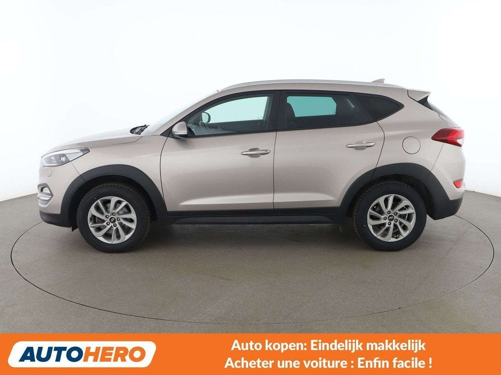 Hyundai Tucson 1.6 Classic blue 2WD (bj 2016), Auto's, Voorwielaandrijving, Gebruikt, Parkeersensor, Beige