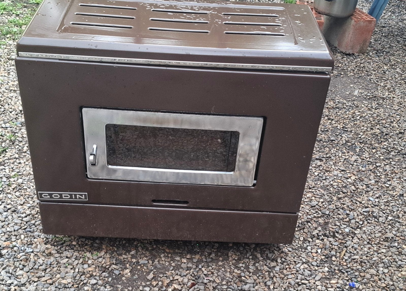 poele godin 10km remis a neuf.  grille et joints, Enlèvement, Utilisé, Brun, Autres matériaux