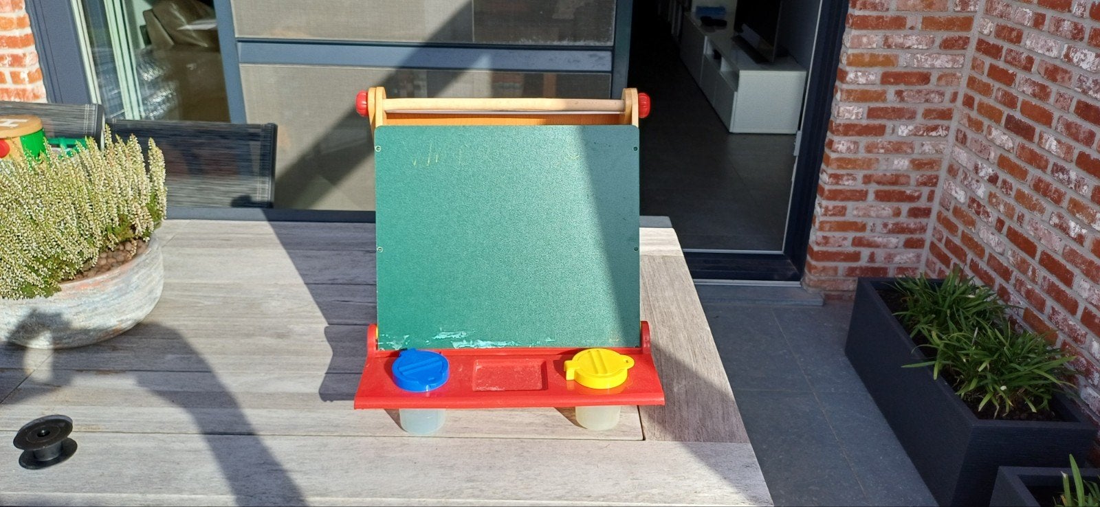 kinder tekenbord, Ophalen