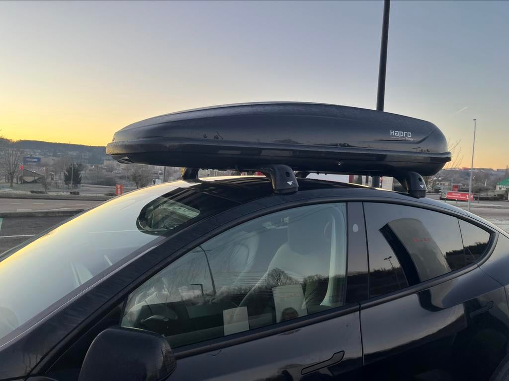 Dakdragers Tesla model Y te huur, Ophalen