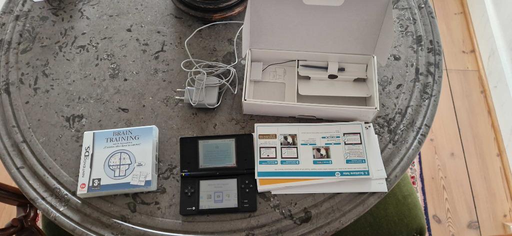 nintendo dsi CIB + brain trainer, Ophalen of Verzenden, Gebruikt, Zwart, Dsi