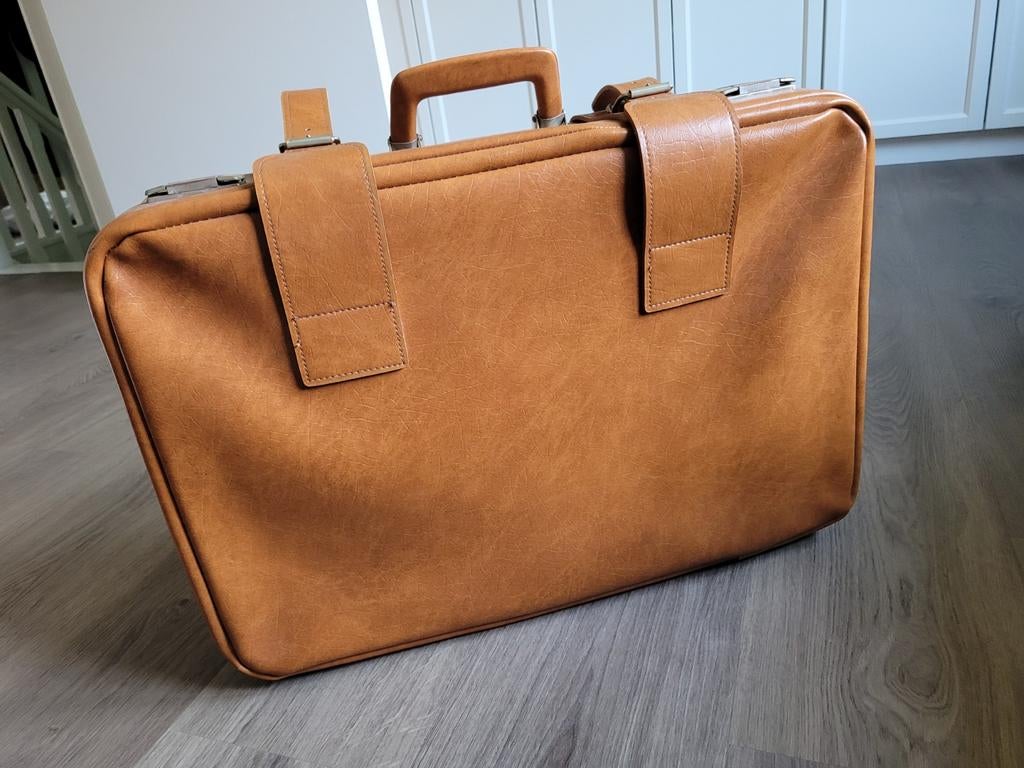 Vintage reiskoffer, Enlèvement
