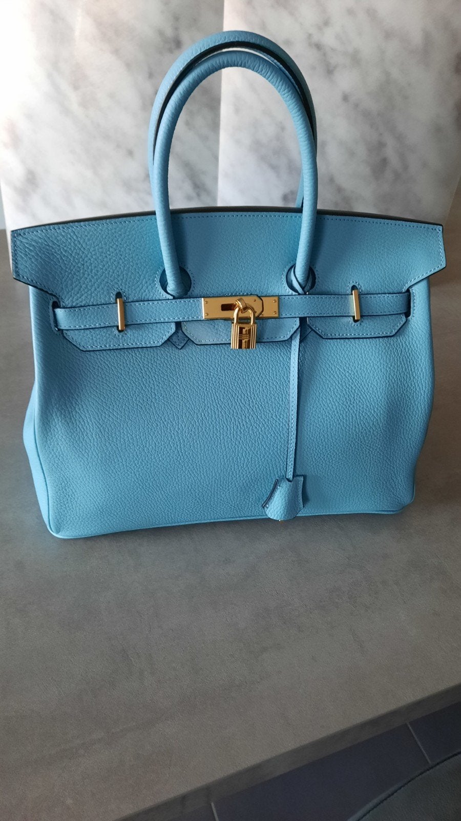 Handtas, Enlèvement, Sac à main