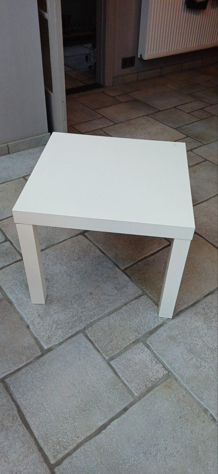 salontafeltje/ bijzettafeltje, Ophalen