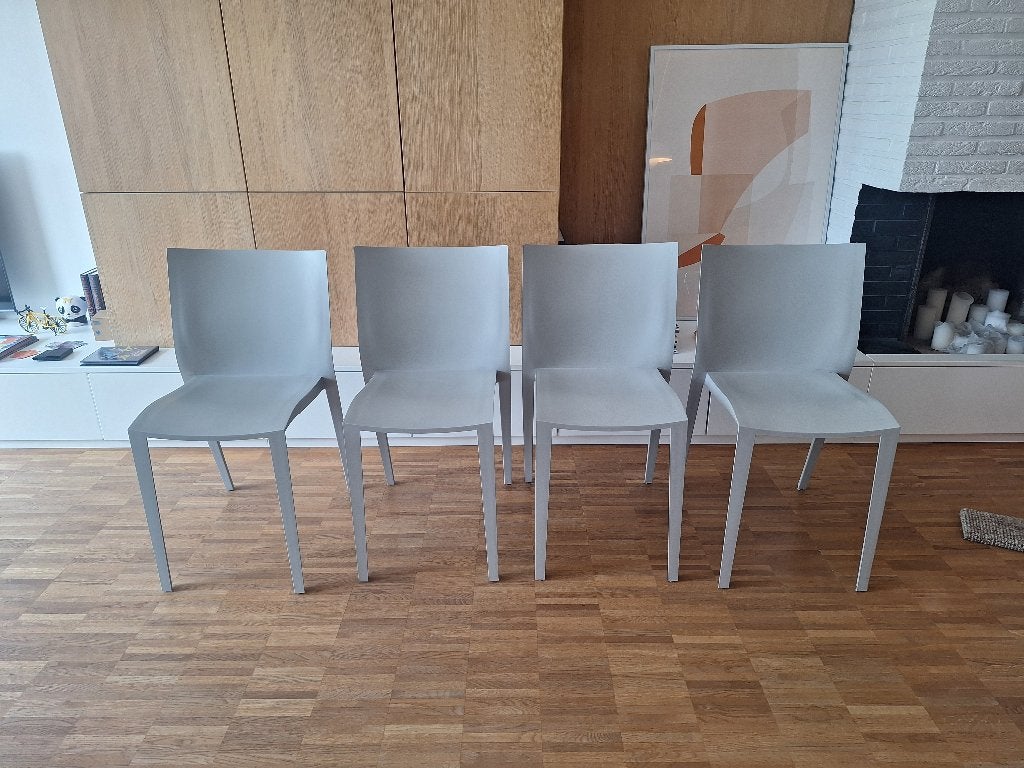 4 stoelen slick-slick Starck in XO, 50 EUR voor de 4 stoelen, Ophalen, Gebruikt, Grijs, Kunststof