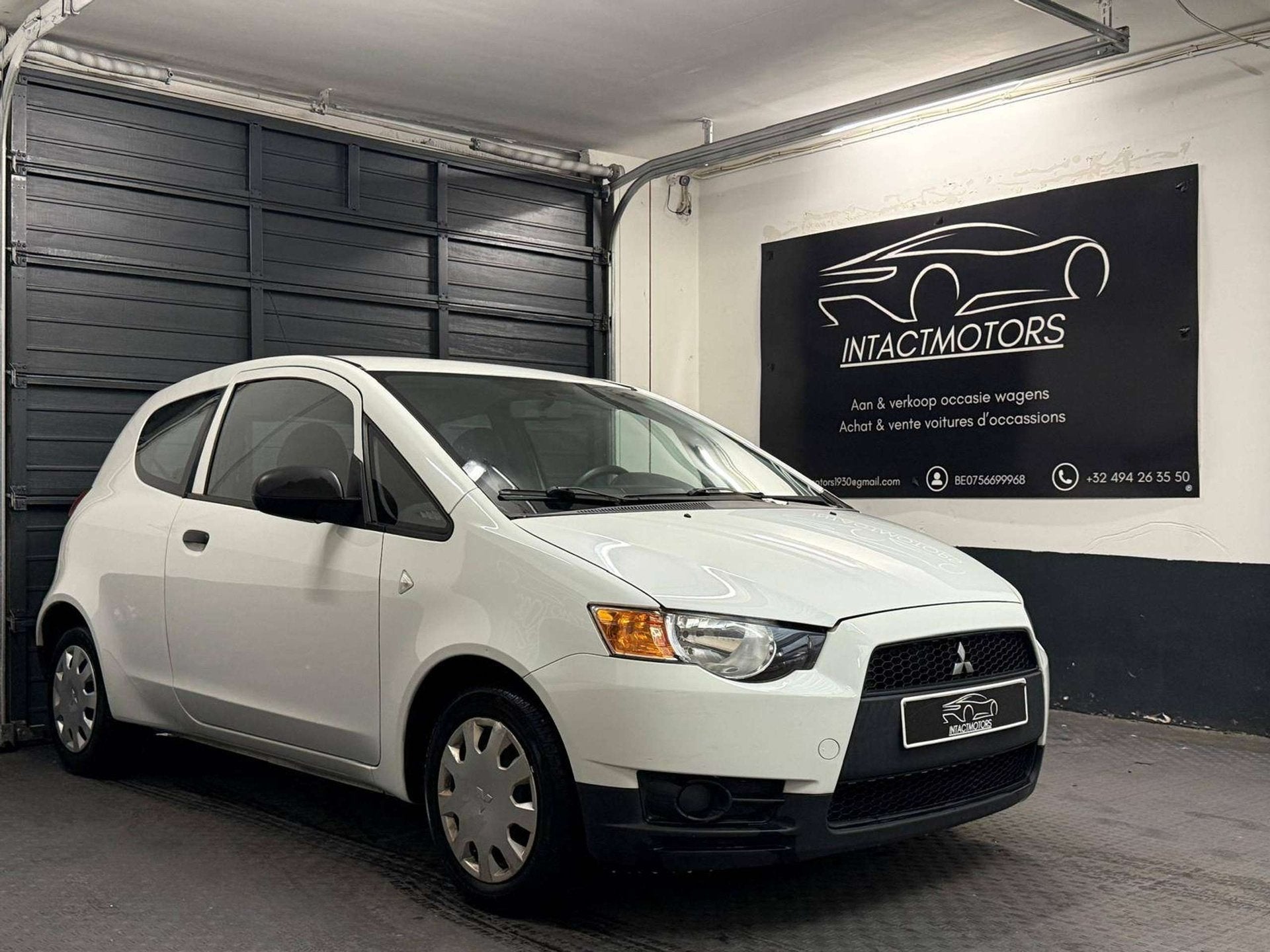 Mitsubishi Colt Colt 1.1i, Auto's, Zwart, Bedrijf, 130 g/km, 3 cilinders