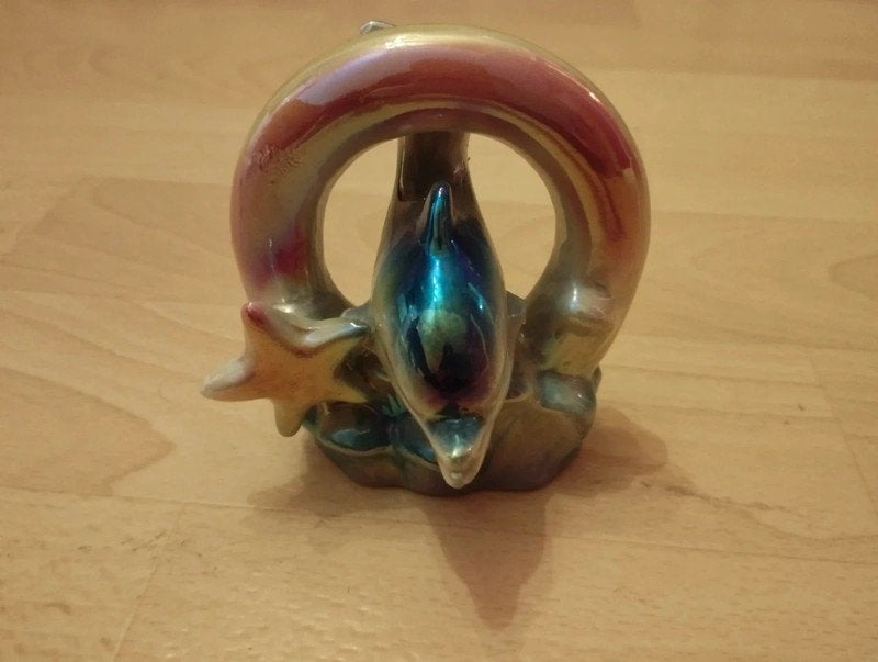 Dauphin multicolore en porcelaine., Enlèvement