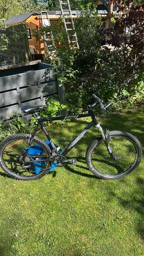 Thompson mountain bike zwart en grijs, Gebruikt, Velgrem, Versnellingen, Ophalen