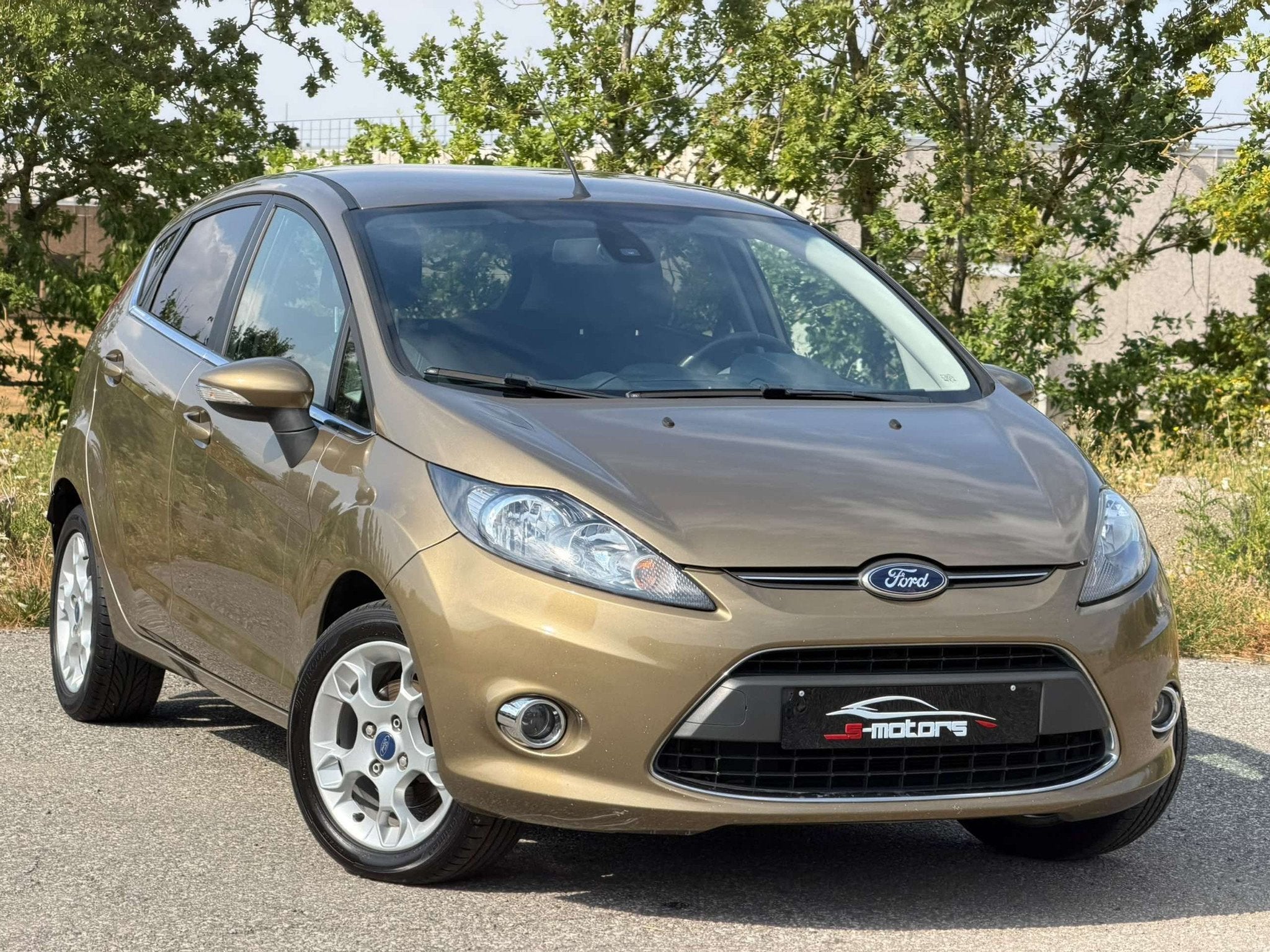 Ford Fiesta Fiesta 1.25i • TITATINUM • AIRCO (bj 2013), Voorwielaandrijving, Gebruikt, Zwart, 4 cilinders