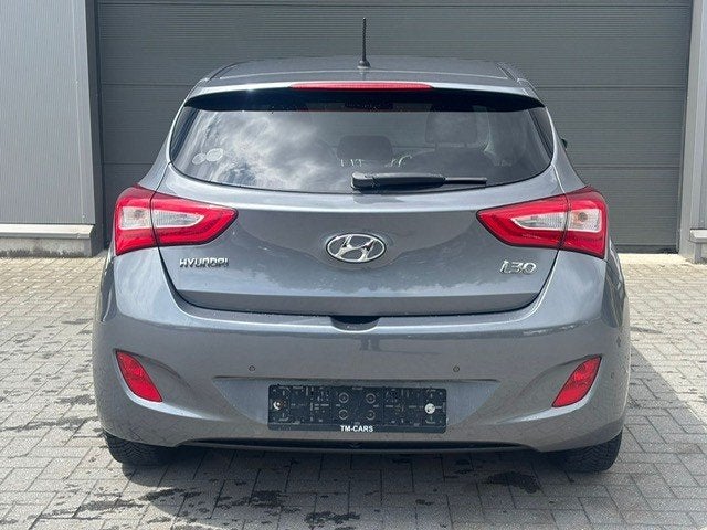 Hyundai I30 benzine 92.000km, Auto's, Voorwielaandrijving, Euro 5, Stof, Zwart