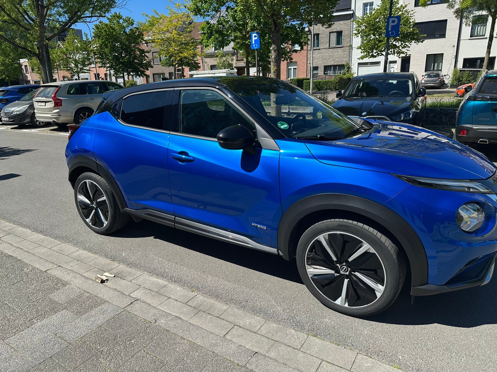 Nissan Juke Hybride N-Design Carplay/Camera/Keyless/Navi, Auto's, Nissan, Automaat, Dealer onderhouden, Euro 6, Blauw