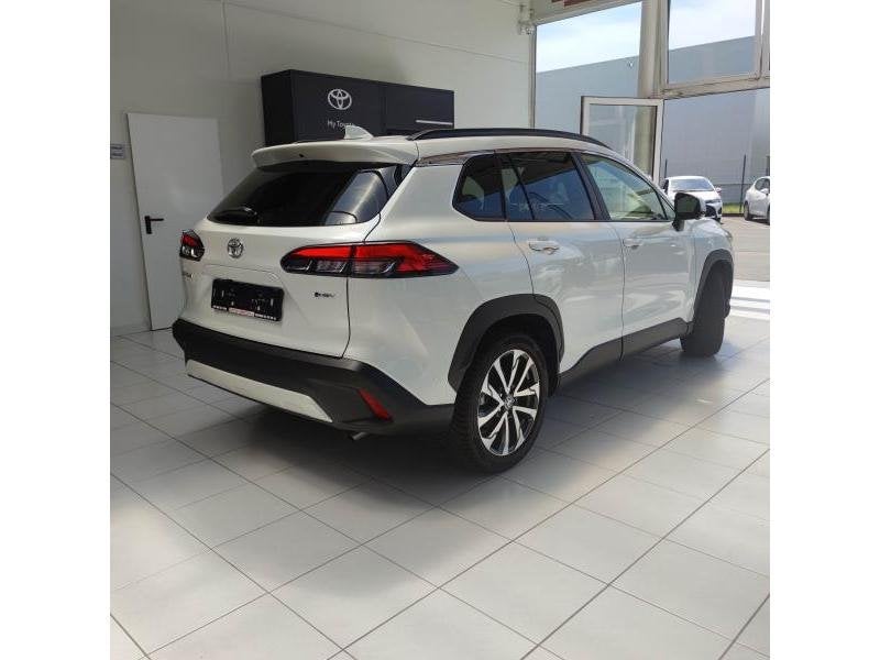 Toyota Corolla Cross Premium, Auto's, Euro 6, Wit, 5 deurs, Hybride Elektrisch/Benzine
