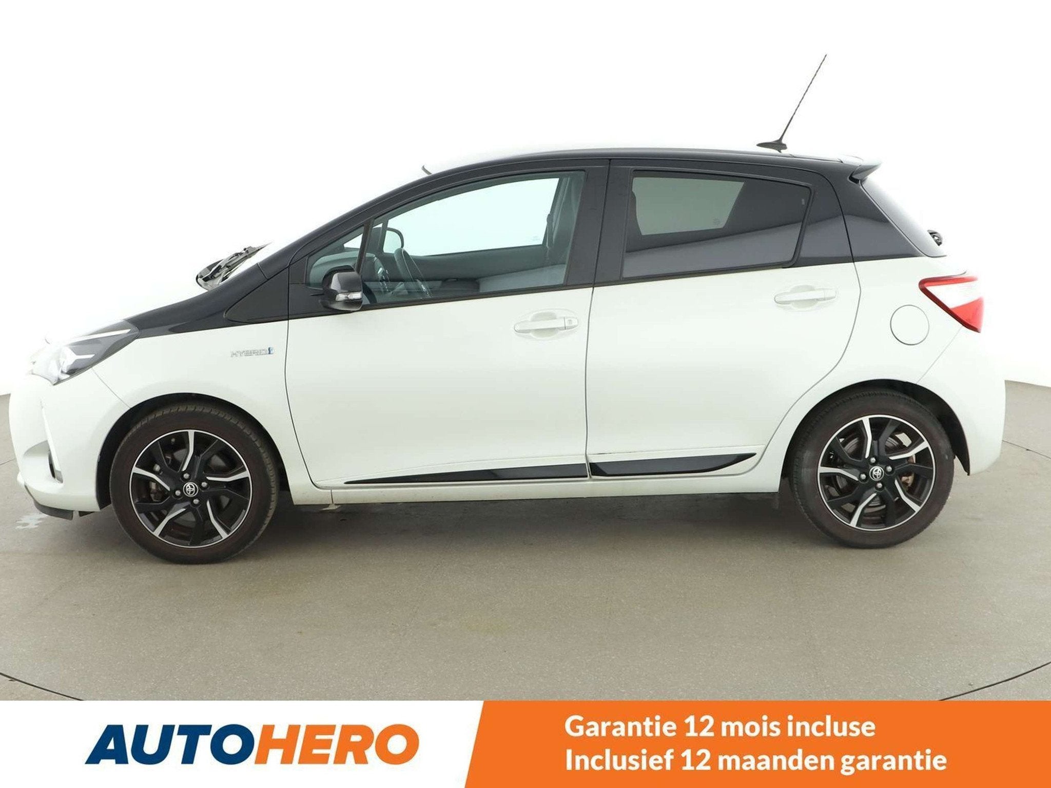 Toyota Yaris 1.5 Hybrid (bj 2018, automaat), Auto's, Gebruikt, Wit, 5 zetels, Hybride Elektrisch/Benzine