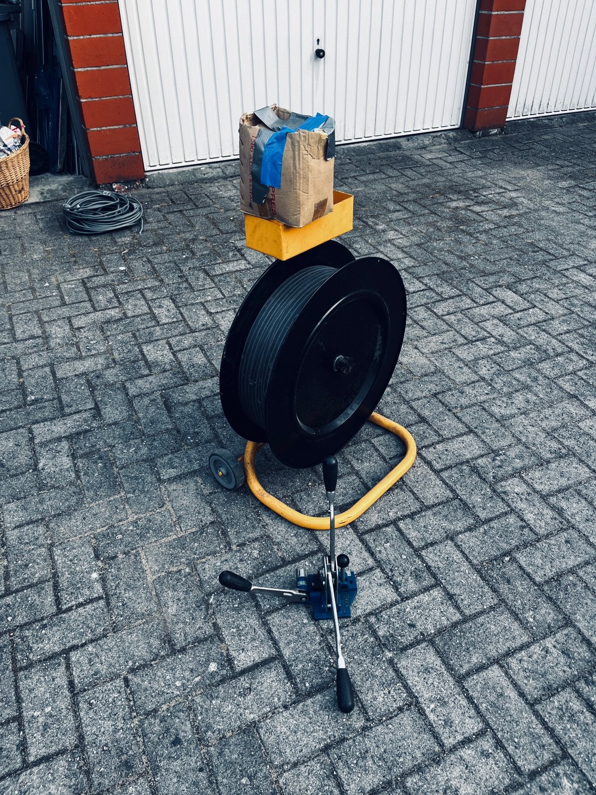 Haspelwagen voor omsnoeringsband, Ophalen