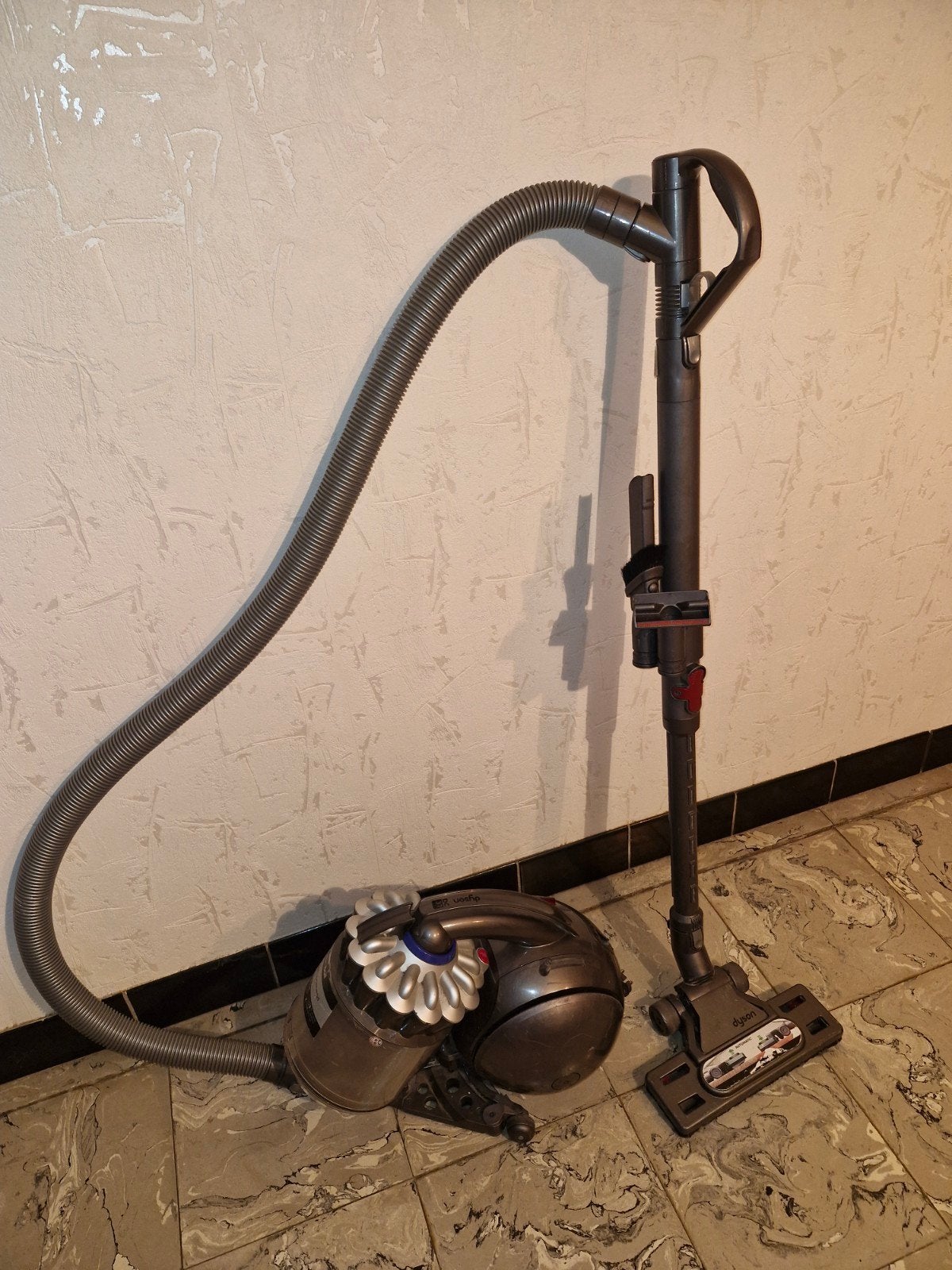 Dyson DC37 stofzuiger, Ophalen, Dyson