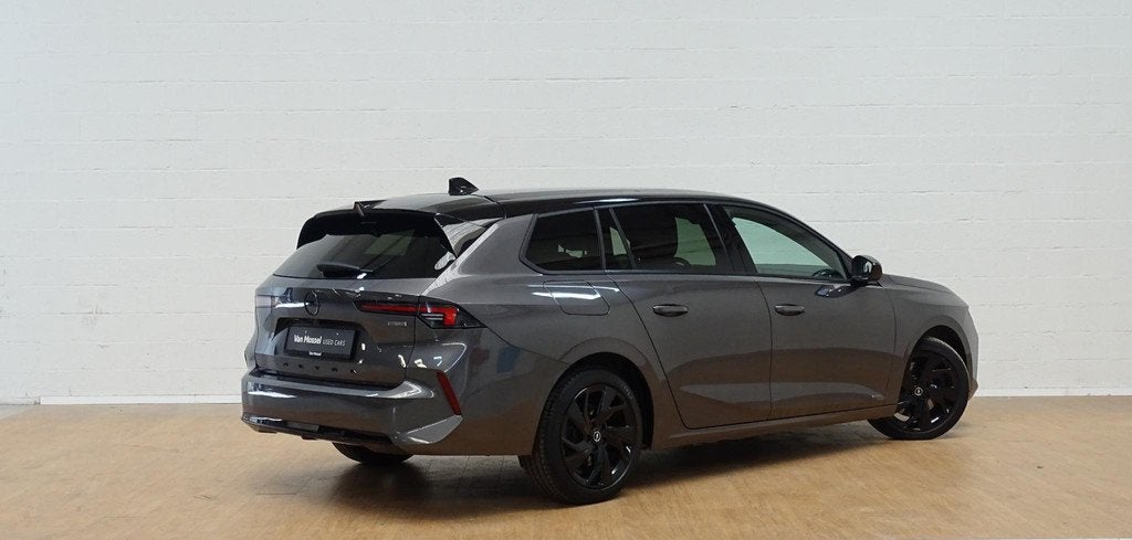 Opel Astra sports tourer 1.6 Turbo Hybrid 132kW GS+open dak, Autos, 12 kWh, Argent ou Gris, Entreprise, Hybride rechargeable