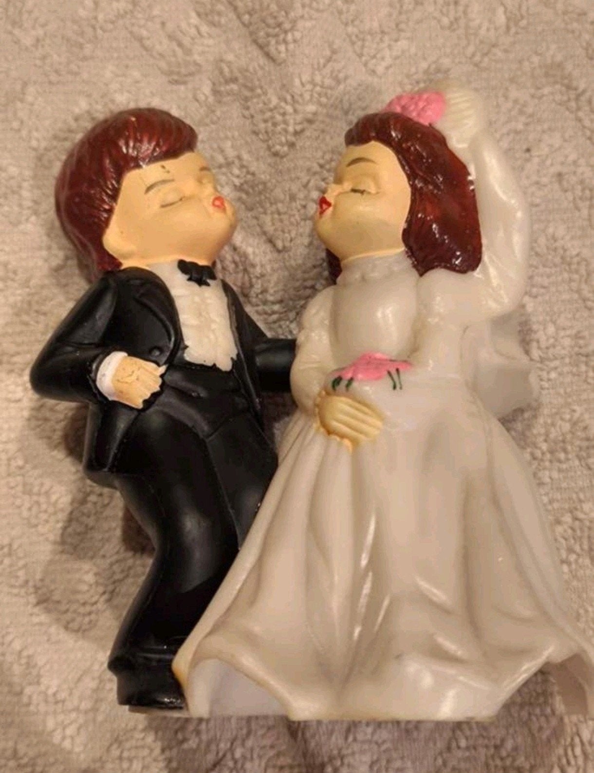 Figuurtje huwelijkstaart, Enlèvement