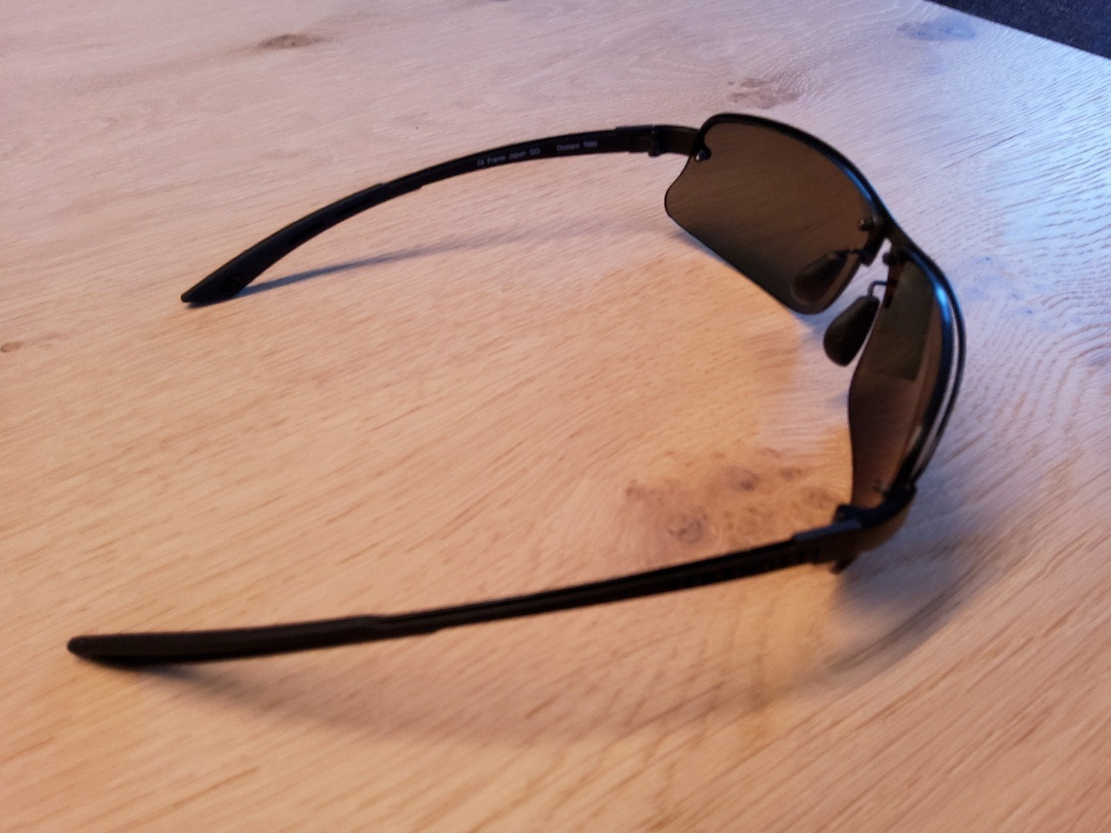 Lunette de soleil SERENGETI, Comme neuf, Noir, Lunettes de soleil, Autres marques