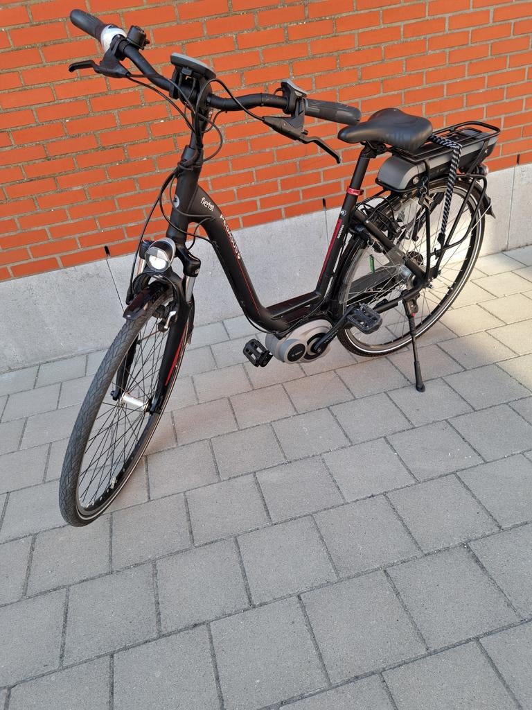 Elektrische fiets middenmotor 2jaar oud, Ophalen, Zo goed als nieuw, 50 km per accu of meer