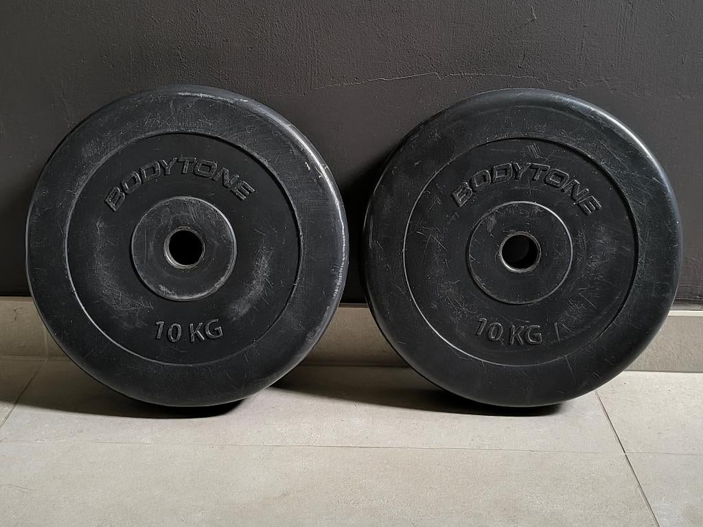 2 x 10kg plaques de musculation (30mm)., Enlèvement, Utilisé, Bras, Plaques d'haltères