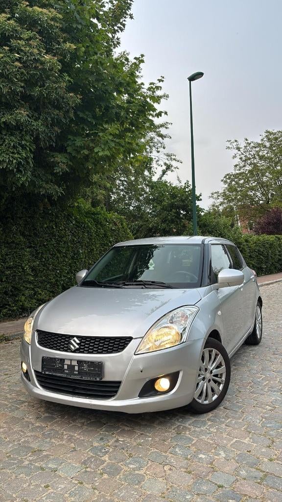 Neat Suzuki 1.2 essence 2012, Autos, Suzuki, Argent ou Gris, Achat, Boîte manuelle, Swift