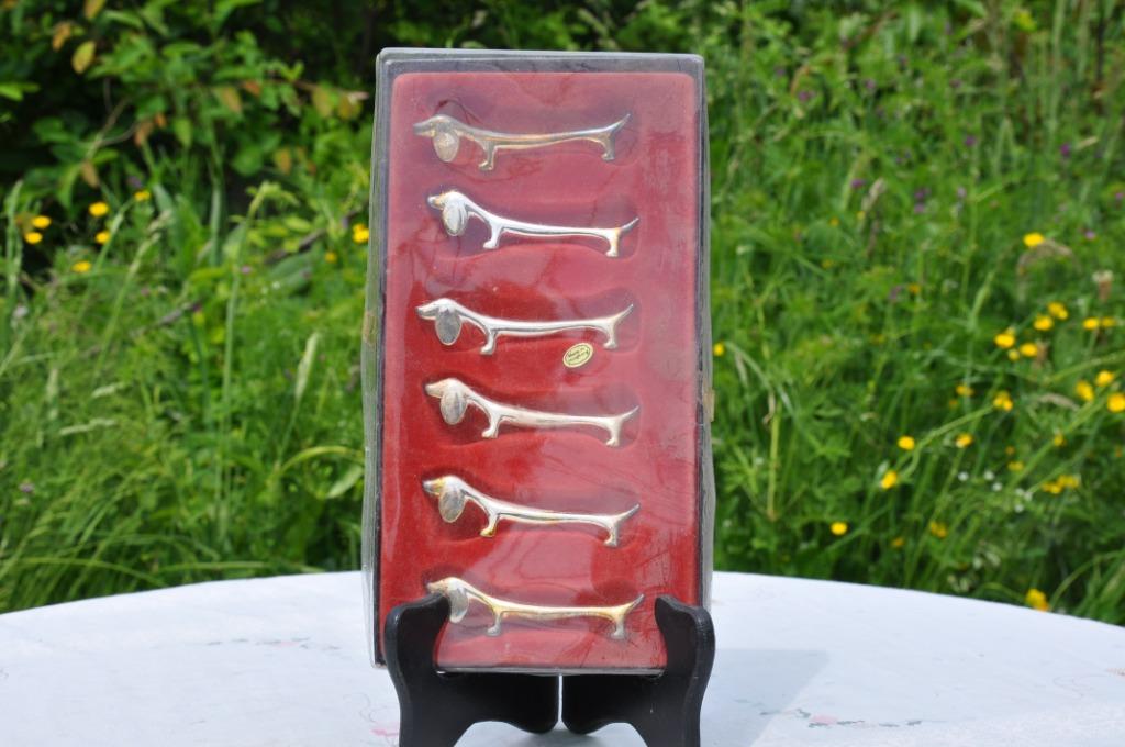 6 porte couteau metal argenté forme tekel, Enlèvement ou Envoi