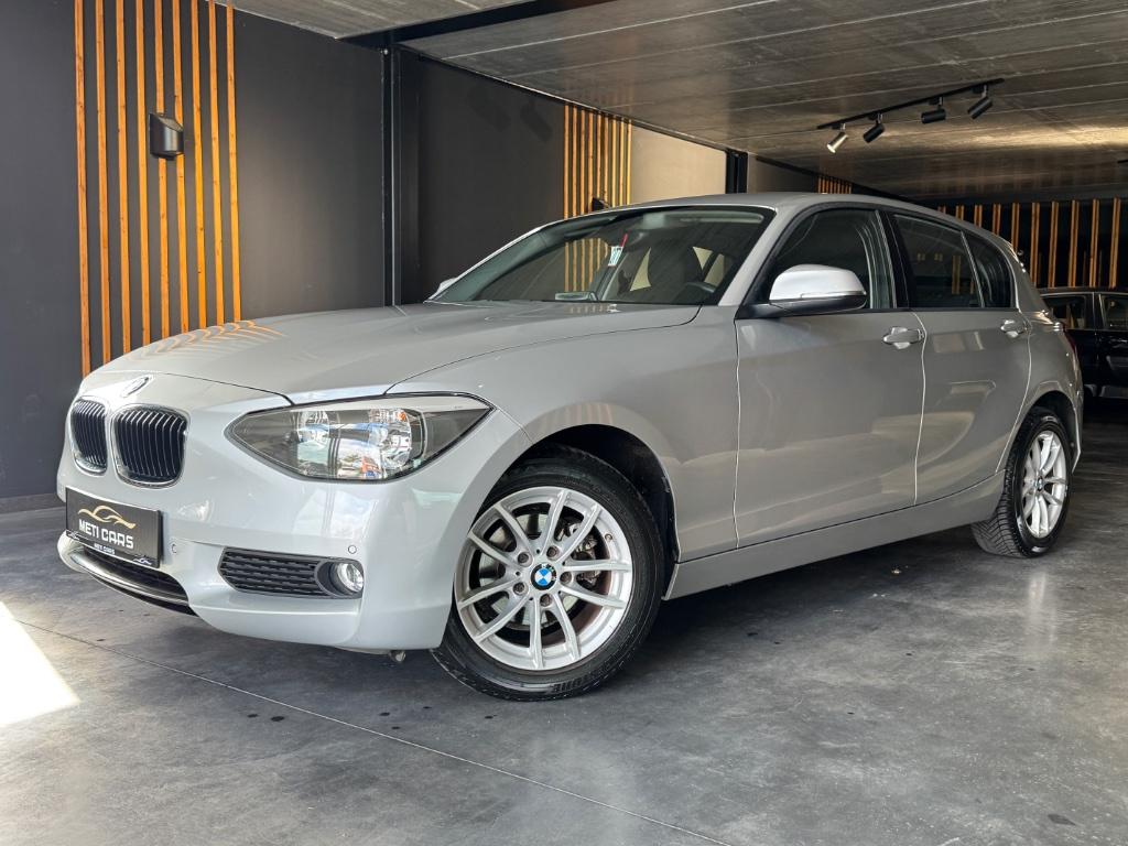 BMW 116 i Urban Line | Cruise Control | Navi | Sensoren |, Auto's, 100 kW, Adaptieve lichten, Zwart, 5 deurs