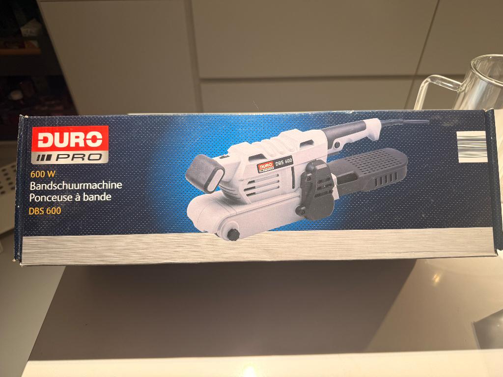 Bandschuurmachine Duro Pro DBS 600, Enlèvement, Neuf, 600 à 1200 watts, Ponceuse à bande