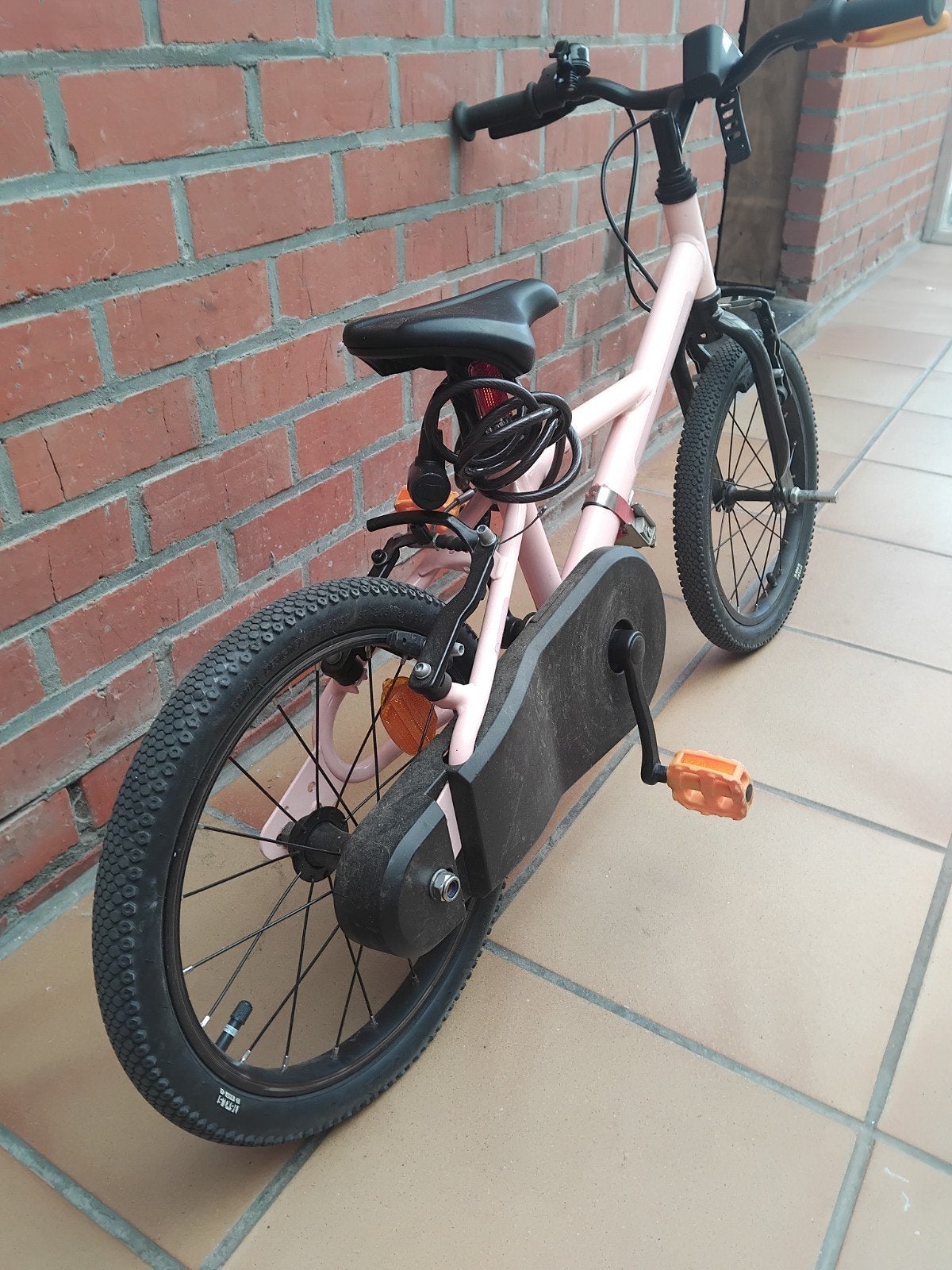 Roze kinderfiets, Ophalen