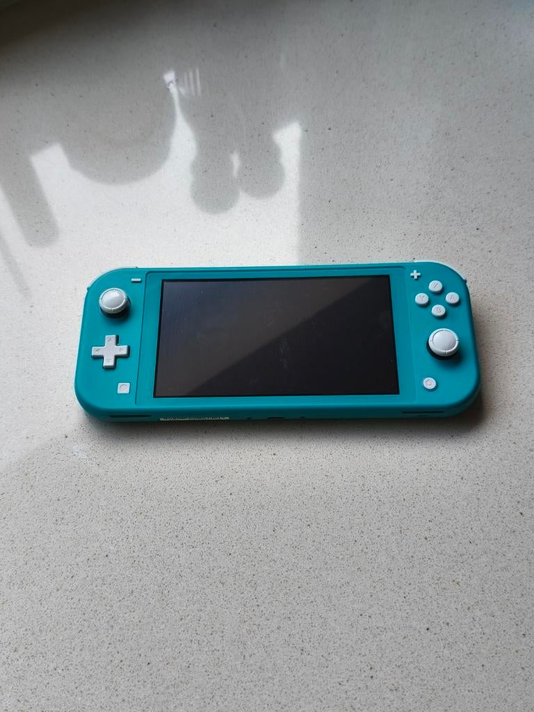 Nintendo Switch lite (licht blauw ), Games en Spelcomputers, Ophalen, Overige kleuren, Zo goed als nieuw, Met beschermhoes of tas