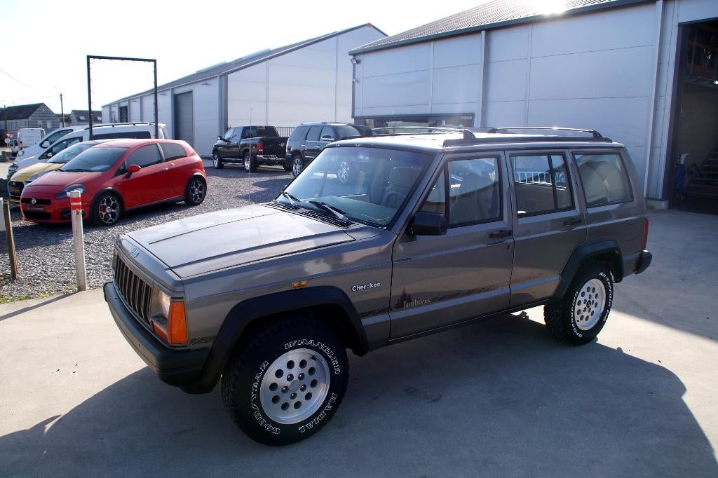 Jeep Cherokee 2.5i 4x4 Oldtimer met garantie, Auto's, Stof, Beige, 4 cilinders, Beige