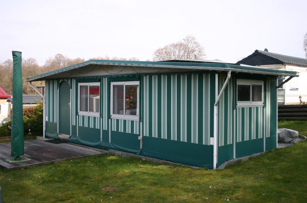 Caravan met voortent aan het meer van Roberville, Ringverwarming, Rondzit, Hobby, Queensbed