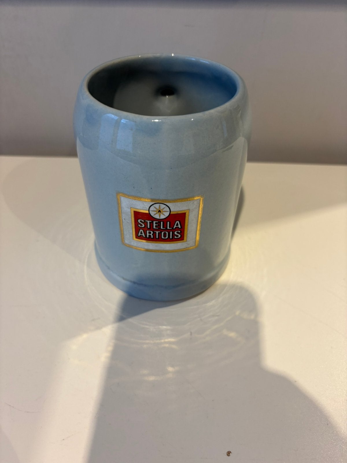 STELLA ARTOIS mok (RF BAUDOUR), Ophalen of Verzenden, Zo goed als nieuw, Stella Artois