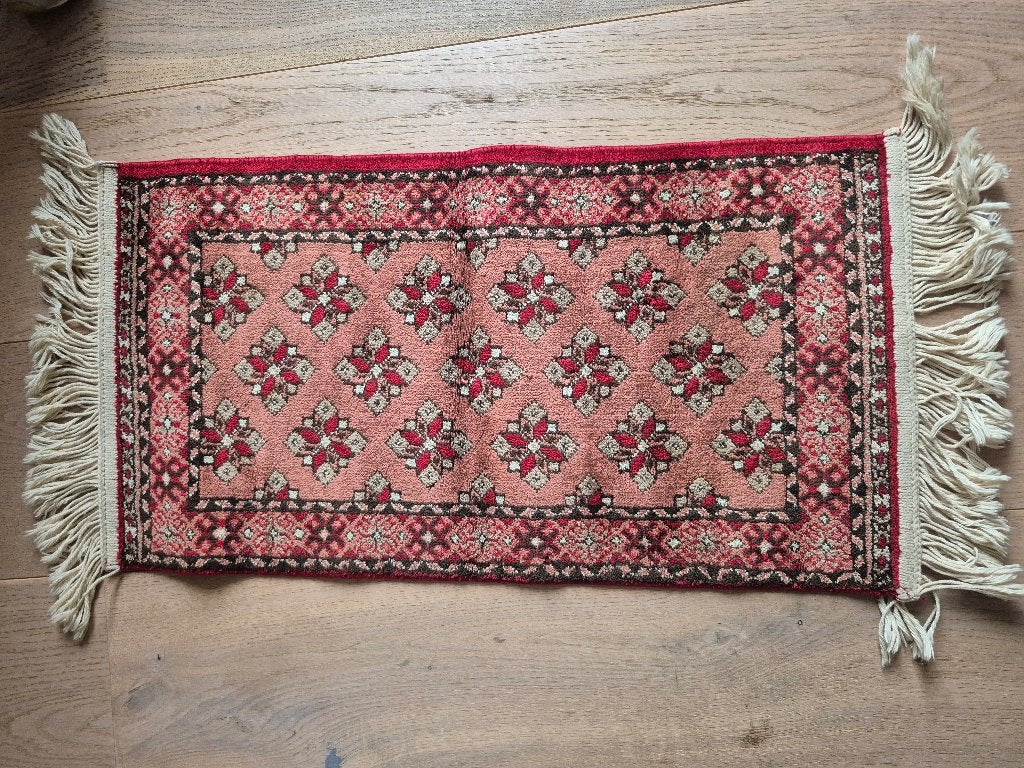 Klein tapijtje, Ophalen, Zo goed als nieuw