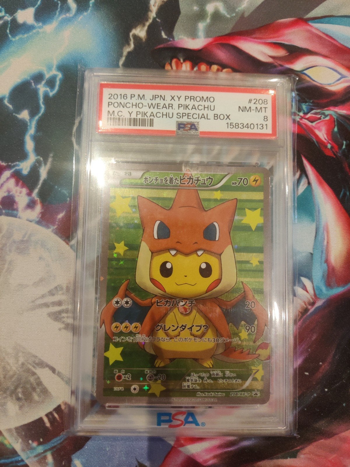 Pikachu poncho Charizard Y PSA 8, Enlèvement ou Envoi