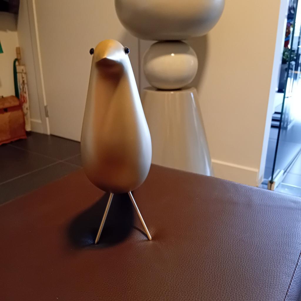 Gouden eames bird replic, Ophalen