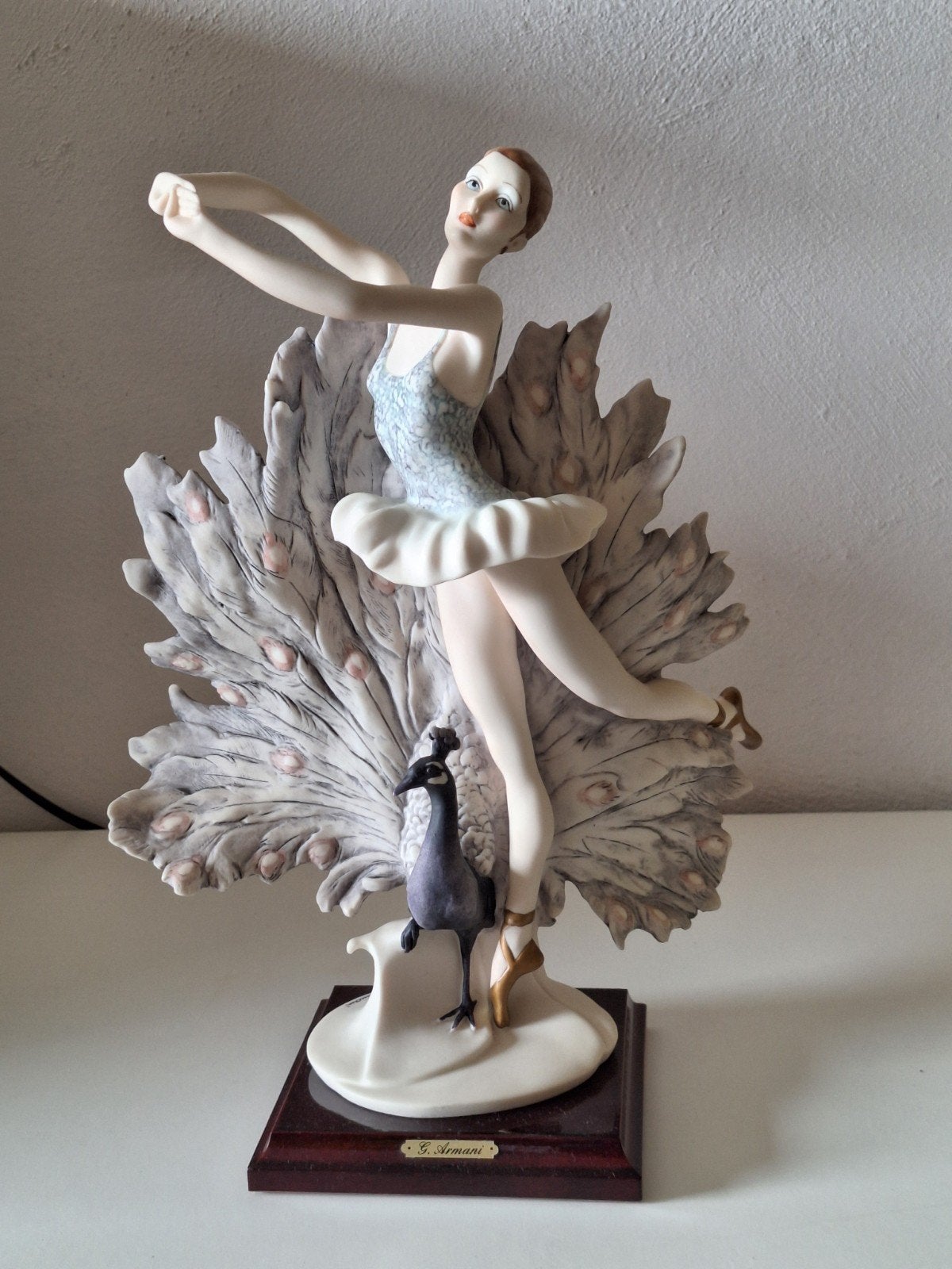 Porceleinen beeldje van ballerina met een pauw, Ophalen