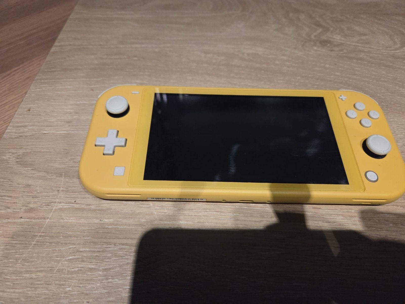 Nintendo switch Lite te koop !, Ophalen, Geel, Zo goed als nieuw, Met beschermhoes of tas