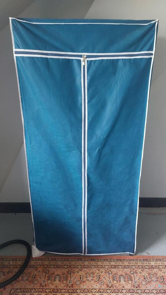 Opvouwbare kledingkast met ritssluiting, Ophalen