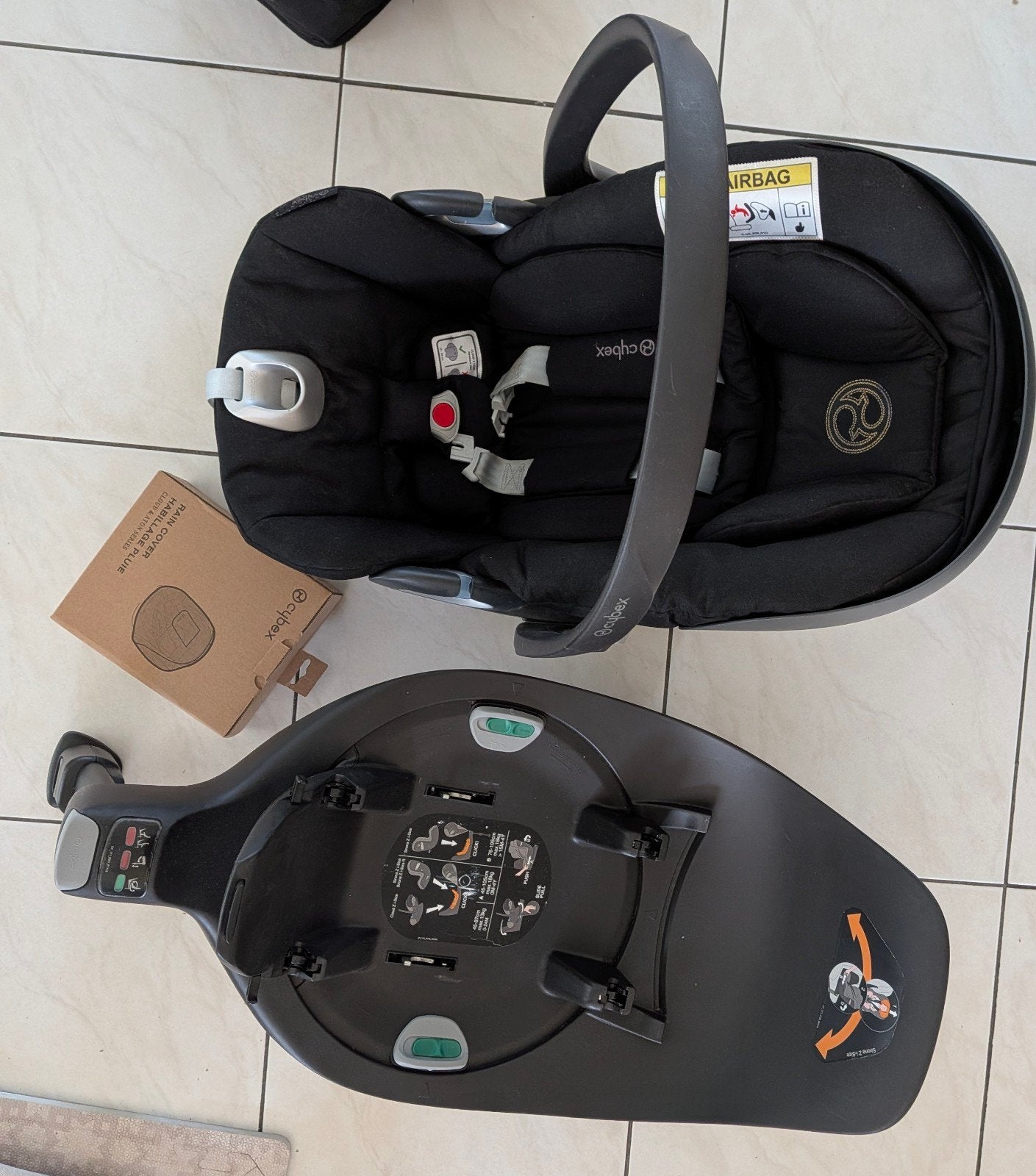 Cybex cloud Z+ platinum met draaivoet en regenhoes, Ophalen