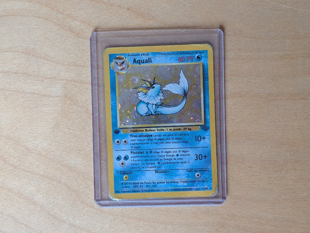Vaporeon/Aquali (JU 12) - First Edition, Ophalen of Verzenden, Gebruikt, Losse kaart, Foil