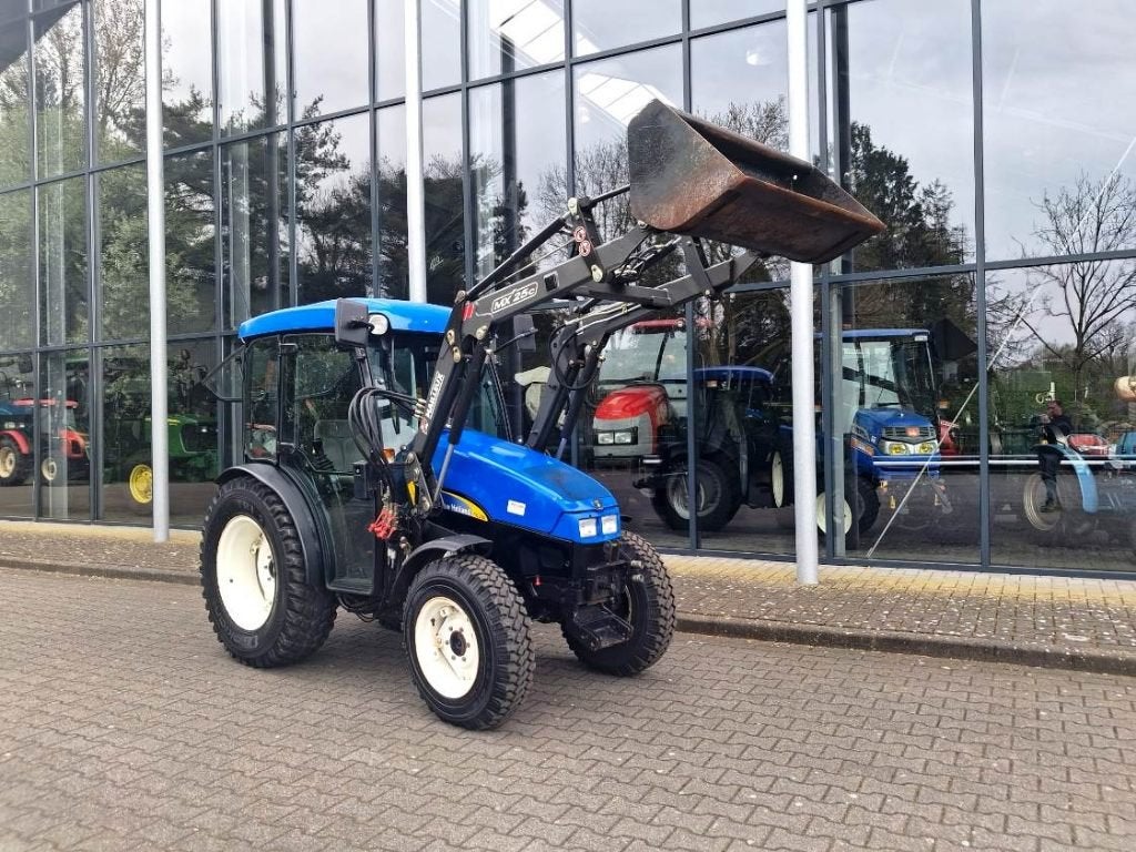 New Holland TCE55 + frontlader, Zakelijke goederen, Gebruikt, 2500 tot 5000, Ophalen of Verzenden, Tot 80 Pk
