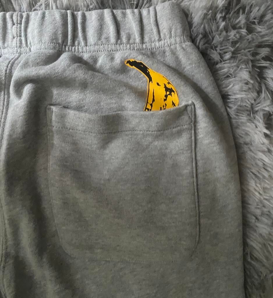 Uniqlo x Kaws Jogging, Verzenden, Zo goed als nieuw, Maat 48/50 (M), Grijs