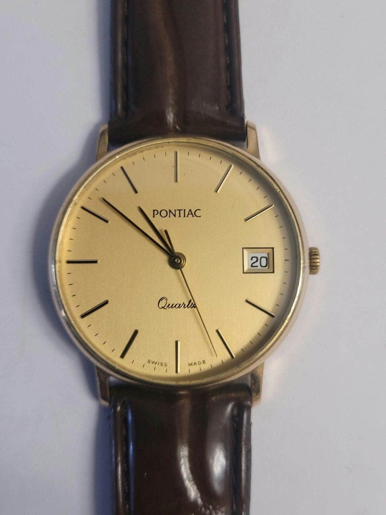 Montre  Pontiac Quartz Date Vintage Swiss Made (MW140), Antiek en Kunst, Ophalen of Verzenden